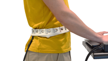 a participant is wearing a 3d printed vibrotactile waistband while performing a task on a computer